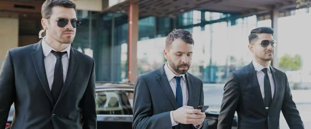 What is executive protection - executive with two guards