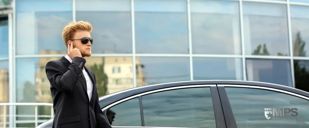 Executive protection agent by car - MPS Security & Protection